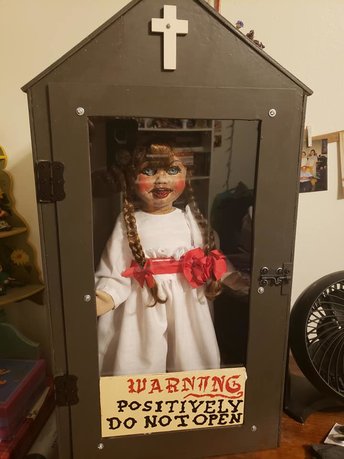 Annabelle Doll in Cabinet